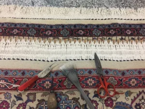 تصویر رفوی فرش و ترمیم آن توسط قالیشویی حریرتهران