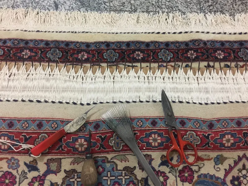 تصویر رفوی فرش و ترمیم آن توسط قالیشویی حریرتهران